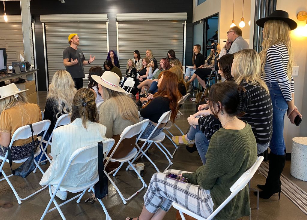 class instruction to group of stylists